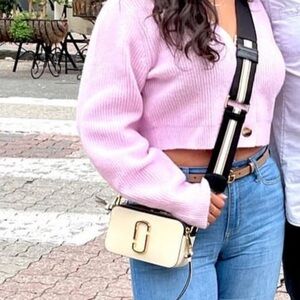 Marc Jacob’s snapshot bag in white, black with gold hardware